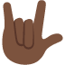 🤟🏿 love-you gesture: dark skin tone display on Twitter